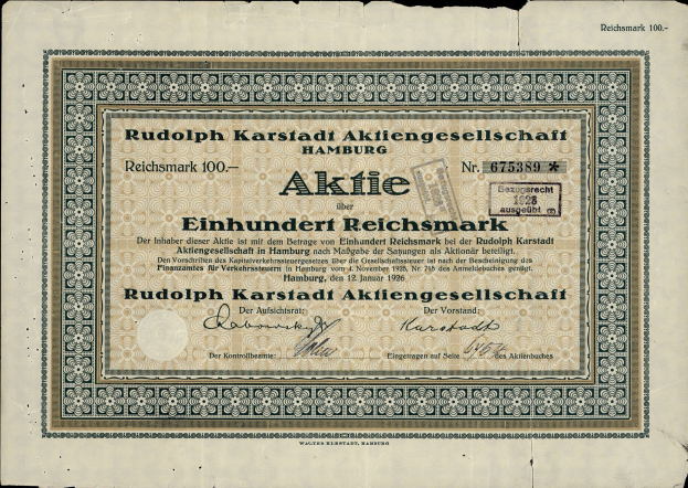 Ein alter deutscher Bankschein mit schwarzem Hintergrund und der Aufschrift "Rudolph Karlstadt Aktiengesellschaft Hamburg"