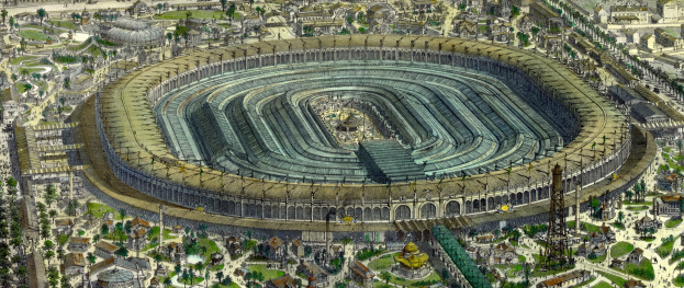 Luftaufnahme eines großen Stadions umgeben von Gebäuden, Bäumen und Gras in einer städtischen Umgebung.