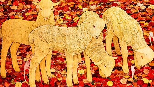 Ein Bild von drei hellbraunen Lämmern, die auf einer Wiese voller roter, orangefarbener und gelber Herbstblätter grasen, unter einem sonnigen Himmel.